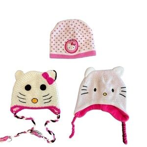 HELLO KITTY HATS. TWO HATS HAVE BRAND TAGS. ONE IS HANDMADE WITH NO TAGS.